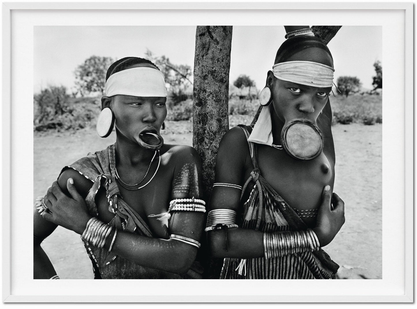 Sebastião Salgado. GENESIS, Art Edition No. 1–100 ‘Two Mursi Women, Omo Valley, Ethiopia’ (English) (AP)